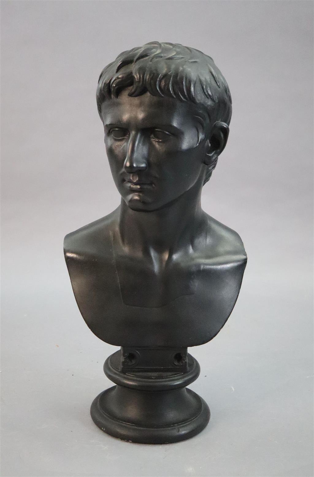 D. Brucciani & Co of London. An ebonised plaster bust of Augustus, height 27in.